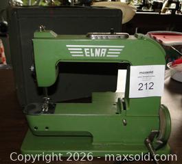 MaxSold Auction: Vintage Elna “Grasshopper” Portable Sewing Machine with Case, Manual and Accessories  - Delta (British Columbia, Canada) SELLER MANAGED Downsizing Online Auction - Norum Place
