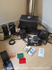 MaxSold Auction: Minolta SR-T 101 35mm SLR with 55mm f/1.7 & 28mm f/2.5 - Vancouver (British Columbia, Canada) PARTNER MANAGED Estate Sale Online Auction - West 13th Avenue