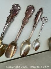 MaxSold Auction: Mixed set of 4–6 silver-plated & enamel souvenir/ornate spoons - Vancouver (British Columbia, Canada) PARTNER MANAGED Estate Sale Online Auction - West 13th Avenue
