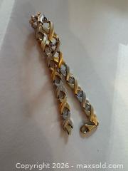 MaxSold Auction: Lightweight 14K White and Yellow Gold Bracelet with lots of kisses (xxx)!  - North Dundas (Ontario, Canada) SELLER MANAGED Downsizing Online Auction - Moffat