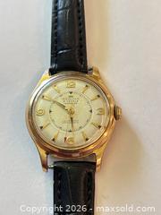 MaxSold Auction: regina(omega) vintage mens watch.  runs!  - North Dundas (Ontario, Canada) SELLER MANAGED Downsizing Online Auction - Moffat Street