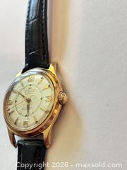 MaxSold Auction: regina(omega) vintage mens watch.  runs!  - North Dundas (Ontario, Canada) SELLER MANAGED Downsizing Online Auction - Moffat Street