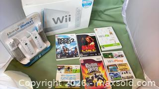 MaxSold Auction: Nintendo Wii Console Bundle with 4–6 Games & Nyko Charger - Greater Napanee (Ontario, Canada) SELLER MANAGED Charity/Fundraising Online Auction - Dundas Street E