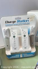 MaxSold Auction: Nintendo Wii Console Bundle with 4–6 Games & Nyko Charger - Greater Napanee (Ontario, Canada) SELLER MANAGED Charity/Fundraising Online Auction - Dundas Street E