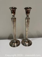 MaxSold Auction: Pair of Cartier Sterling Silver Weighted Candlesticks #1 - Toronto (Ontario, Canada) SELLER MANAGED Downsizing Online Auction - Heathdale Road