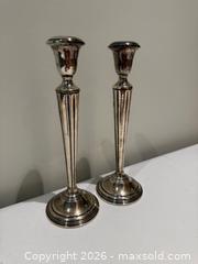 MaxSold Auction: Pair of Cartier Sterling Silver Weighted Candlesticks #1 - Toronto (Ontario, Canada) SELLER MANAGED Downsizing Online Auction - Heathdale Road