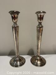 MaxSold Auction: Pair of Cartier Sterling Silver Weighted Candlesticks #2 - Toronto (Ontario, Canada) SELLER MANAGED Downsizing Online Auction - Heathdale Road