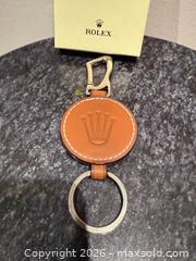 MaxSold Auction: Rolex Brown Leather Key Ring with Original Box, Like New - Toronto (Ontario, Canada) SELLER MANAGED Downsizing Online Auction - Heathdale Road