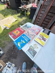 MaxSold Auction: Assorted Car Books lot 211 - Ottawa (Ontario, Canada) SELLER MANAGED Downsizing Online Auction -  Mackey