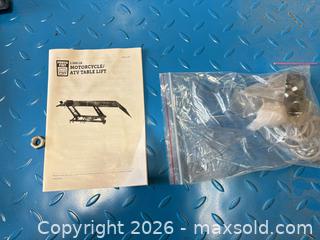 MaxSold Auction: Brand New PowerFist 1000lb Motorcycle ATV Table Lift lot 332n - Ottawa (Ontario, Canada) SELLER MANAGED Downsizing Online Auction -  Mackey