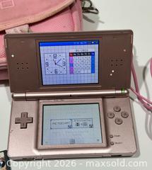 MaxSold Auction: Nintendo DS Lite Handheld Bundle w/ 11 Games and Carrycase - Burlington (Ontario, Canada) SELLER MANAGED Estate Sale Online Auction - Fairview Street (STORAGE)