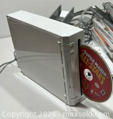 MaxSold Auction: Nintendo Wii Video Gaming Console Bundle-13 Games, 3 Remotes & 2 Sensor Bars - Burlington (Ontario, Canada) SELLER MANAGED Estate Sale Online Auction - Fairview Street (STORAGE)