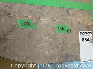 MaxSold Auction: 10K Gold Necklace and a Single 14K Gold Earring with Stone Accent - Prince Edward (Ontario, Canada) PARTNER MANAGED Downsizing Online Auction - Cannery Road