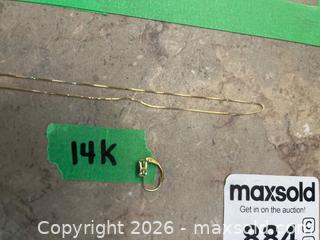 MaxSold Auction: 10K Gold Necklace and a Single 14K Gold Earring with Stone Accent - Prince Edward (Ontario, Canada) PARTNER MANAGED Downsizing Online Auction - Cannery Road