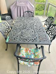 MaxSold Auction: Black Cast Aluminum & Wrought Iron Outdoor Dining Set for 6 - Brighton (Ontario, Canada) PARTNER MANAGED Downsizing Online Auction - Rosslyn Drive