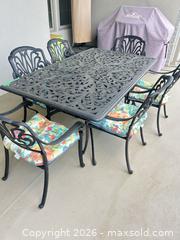 MaxSold Auction: Black Cast Aluminum & Wrought Iron Outdoor Dining Set for 6 - Brighton (Ontario, Canada) PARTNER MANAGED Downsizing Online Auction - Rosslyn Drive