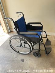 MaxSold Auction: Vive Manual Wheelchair, Blue/Black, 24in Rear Wheels - Knightdale (North Carolina, USA) PARTNER MANAGED Downsizing Online Auction - Sycamore Street