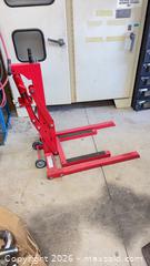 MaxSold Auction: Red 1100 lb Motorcycle Lift/Hoist with Hand Pump & Wheels - Mapleton (Ontario, Canada) PARTNER MANAGED Downsizing Online Auction - Wellington County Road 109