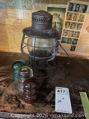 MaxSold Auction: Antique Metal Railroad Lantern with 3 Glass Insulators A - Central Frontenac (Ontario, Canada) Downsizing Online Auction - Clement Road