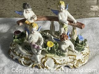 MaxSold Auction: Italian Hand-Painted Porcelain Cherub Figurine, 6x8x5 in - Toronto (Ontario, Canada) SELLER MANAGED Downsizing Online Auction - O'connor Drive (CONDO)