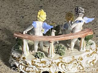 MaxSold Auction: Italian Hand-Painted Porcelain Cherub Figurine, 6x8x5 in - Toronto (Ontario, Canada) SELLER MANAGED Downsizing Online Auction - O'connor Drive (CONDO)