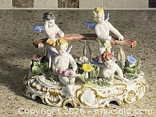MaxSold Auction: Italian Hand-Painted Porcelain Cherub Figurine, 6x8x5 in - Toronto (Ontario, Canada) SELLER MANAGED Downsizing Online Auction - O'connor Drive (CONDO)