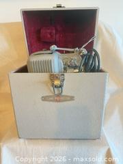 MaxSold Auction: Elmo E-80 8mm / Super 8 Film Projector, Silver/Gray - Toronto (Ontario, Canada) SELLER MANAGED Downsizing Online Auction -  Weston Road (CONDO)