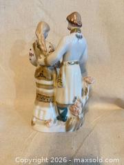 MaxSold Auction: Porcelain figurine pair in folk Ukrainian costume, marked, 10" - Toronto (Ontario, Canada) SELLER MANAGED Downsizing Online Auction -  Weston Road (CONDO)