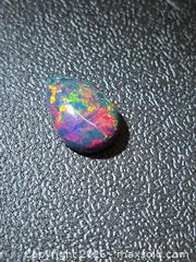 MaxSold Auction: Museum grade Ethiopian black opal  - Toronto (Ontario, Canada) PARTNER MANAGED Reseller Online Auction - Gerrard Street