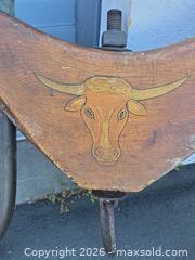 MaxSold Auction: Vintage Wood and Metal Ox Yoke with Hand-Painted Bull Motif - San Rafael (California, USA) PARTNER MANAGED Reseller Online Auction - Du Bois