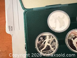 MaxSold Auction: 1988 Calgary Winter Olympics Royal Canadian Mint 11-Coin Set A - Ottawa (Ontario, Canada) PARTNER MANAGED Downsizing Online Auction -  Kimmins Court
