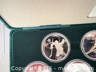 MaxSold Auction: 1988 Calgary Winter Olympics Royal Canadian Mint 11-Coin Set A - Ottawa (Ontario, Canada) PARTNER MANAGED Downsizing Online Auction -  Kimmins Court