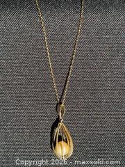MaxSold Auction: 10K Gold Yellow Gold Chain with Caged Pearl Pendant - Ottawa (Ontario, Canada) PARTNER MANAGED Downsizing Online Auction - Lonsdale Road.