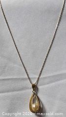 MaxSold Auction: 10K Gold Yellow Gold Chain with Caged Pearl Pendant - Ottawa (Ontario, Canada) PARTNER MANAGED Downsizing Online Auction - Lonsdale Road.