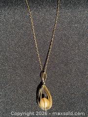 MaxSold Auction: 10K Gold Yellow Gold Chain with Caged Pearl Pendant - Ottawa (Ontario, Canada) PARTNER MANAGED Downsizing Online Auction - Lonsdale Road.