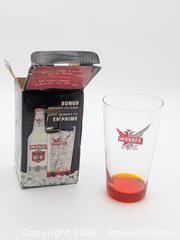 MaxSold Auction: Smirnoff Ice Branded Drinking Glass with Orange Bottom - Cobourg (Ontario, Canada) SELLER MANAGED Downsizing Online Auction - Division Street