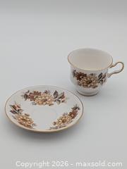 MaxSold Auction: Vintage Queen Anne Fine Bone China Teacup & Saucer Set - Yellow and Orange Flowers - Cobourg (Ontario, Canada) SELLER MANAGED Downsizing Online Auction - Division Street