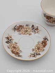 MaxSold Auction: Vintage Queen Anne Fine Bone China Teacup & Saucer Set - Yellow and Orange Flowers - Cobourg (Ontario, Canada) SELLER MANAGED Downsizing Online Auction - Division Street