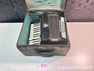 MaxSold Auction: Catena Piano Accordion, Keyboard Right-Hand, Black & Ivory - Warwick (Rhode Island, USA) SELLER MANAGED Reseller Online Auction - Warwick Avenue