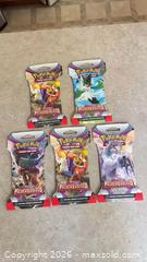 MaxSold Auction: Pokémon Paldea Evolved (Scarlet & Violet) Booster Packs — 5 - Ogden (New York, USA) SELLER MANAGED Downsizing Online Auction - Village Hill Drive