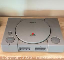 MaxSold Auction: Sony PlayStation (PS1) Original Console Gray - Ogden (New York, USA) SELLER MANAGED Downsizing Online Auction - Village Hill Drive