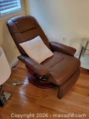 MaxSold Auction: Brown Faux Leather Recliner Glider with Swivel & Footrest - Strathroy-Caradoc (Ontario, Canada) SELLER MANAGED Estate Sale Online Auction - Scott Street E