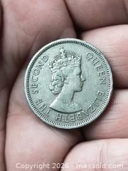 MaxSold Auction: 1960 Hong Kong One Dollar Coin, Queen Elizabeth II - South Frontenac (Ontario, Canada) SELLER MANAGED Downsizing Online Auction - Battersea Road