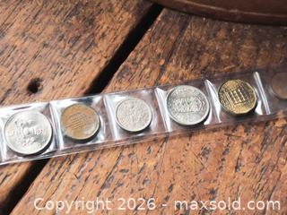 MaxSold Auction: Lot of 6 British Coins (Penny, Threepence, Shilling, 5p) high Grade mint - South Frontenac (Ontario, Canada) SELLER MANAGED Downsizing Online Auction - Battersea Road