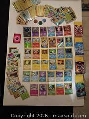MaxSold Auction: Mixed Pokemon Trading Cards - 100+ Cards (English & Japanese) - Redwood City (California, USA) SELLER MANAGED Estate Sale Online Auction - King Street (CONDO)