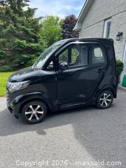 MaxSold Auction: Black EZ Rides Mobility Vehicle with Wanda 125/65-12 Tires VIN:HM5KE2Z00RA400209 - Kingston (Ontario, Canada) PARTNER MANAGED Downsizing Online Auction - Kingsdale Avenue