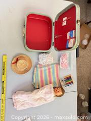 MaxSold Auction: Vintage 12–16in Baby Doll with Original Clothes & Case - Denver (Colorado, USA) PARTNER MANAGED Estate Sale Online Auction - East Hawaii Place