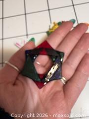 MaxSold Auction: Set of 4 Small Multicolor Holiday Brooch Pins - Hamilton (Ontario, Canada) SELLER MANAGED Reseller Online Auction - Kensington Avenue North