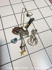 MaxSold Auction: Silver-Plated Necklace & Pendants with Blue Stone Ring Size 7 - Hamilton (Ontario, Canada) SELLER MANAGED Reseller Online Auction - Kensington Avenue North