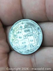MaxSold Auction: Nepal 1 Rupee Coin, Cupronickel Multi-sided (Dodecagonal) - South Frontenac (Ontario, Canada) SELLER MANAGED Downsizing Online Auction - Battersea Road